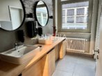 Erstbezug nach Renovierung: Moderne Büros an der Augustaanlage - Auf Wunsch im Industrial Design - Mieterausbaubeispiel WC